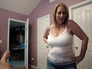 Blonde bombshell Danni Jones gives a bouncing boob show in hot video
